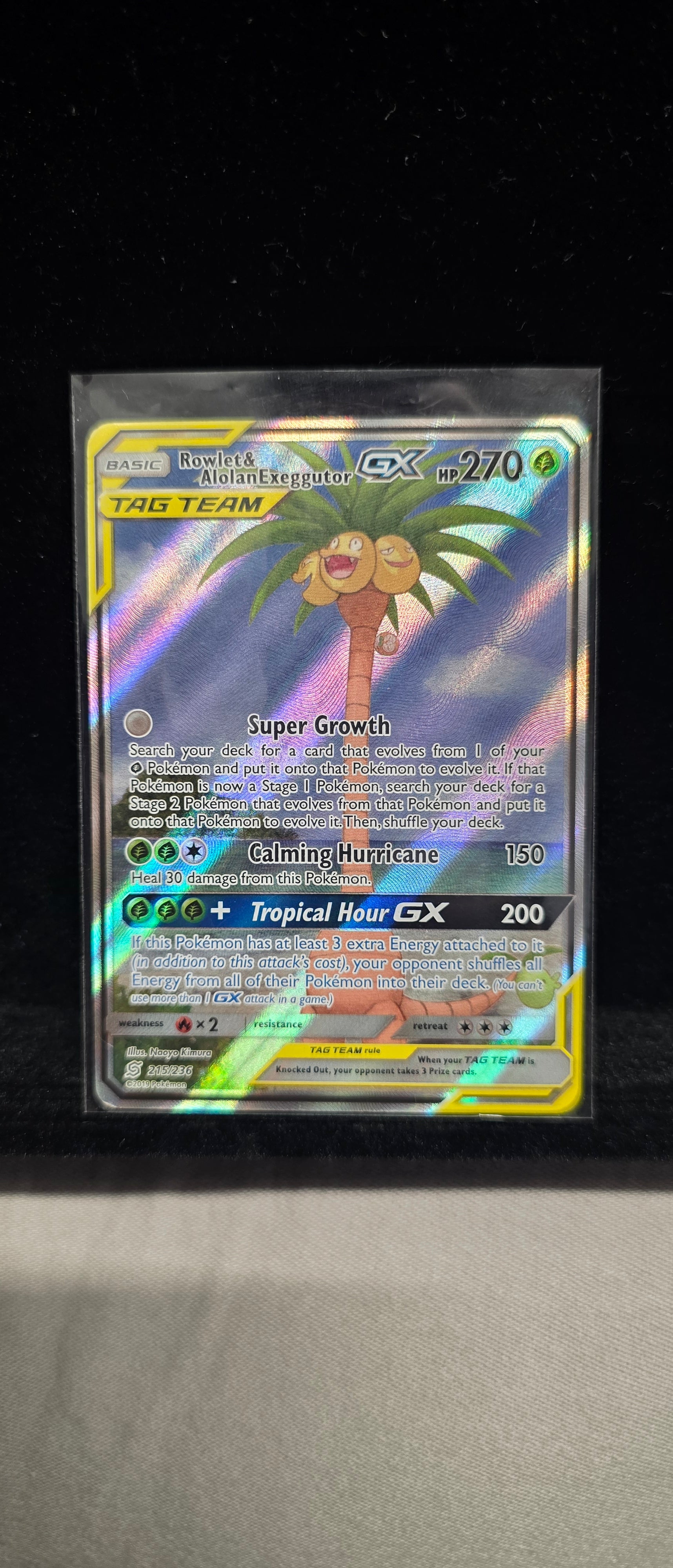 #Pk004 Rowlet & Alolan Exeggutor GX Tag Team Full Art – Unified Minds 215/236 Holofoil Pokémon Card