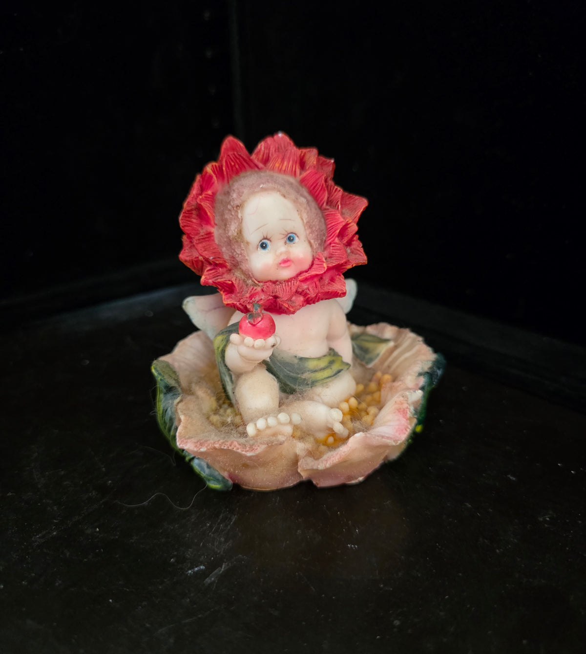 #P027 Whimsical Flower Fairy Baby Figurine – Cherub in Blossom Holding Red Apple, Vintage-Style Decor